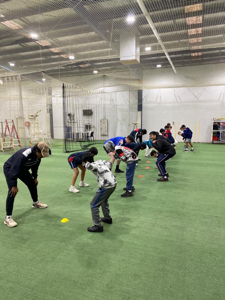 Junior with batting kit